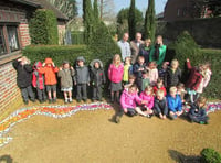 Petersfield pupils turn simple stones into a colourful Physic Garden show