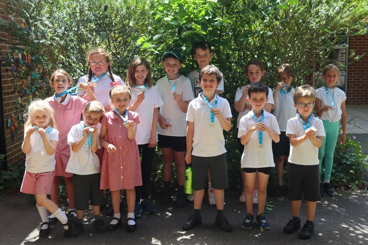 All pupils and staff at Greatham Primary School took part in the Cancer Research UK Race For Life 2022, walking or running a mile in PE to raise more than £600. 