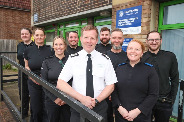 Hampshire's new chief constable Scott Chilton with staff at Portsmouth Norse Neighbourhood Police Office