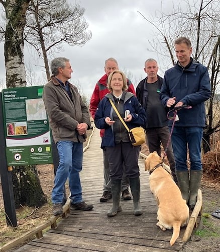 MP Jeremy Hunt expressed gratitude for the efforts of many individuals, but especially the local communities, in quickly rebuilding Thursley National Nature Reserve's boardwalk after the 2020 fire