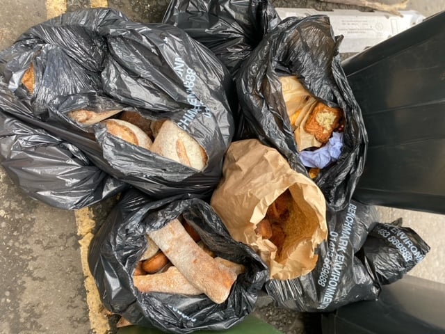 Debbie Flowerday counted eight black bin-liners full of bread and pastries outside of Gail's Bakery in Farnham