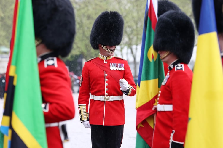 Image of military personnel, seen here at Wellington Barracks in London, before taking part in the King's Coronation.

The UK Armed Forces conduct their largest ceremonial operation for 70 years today (06/05/2023), and accompanied Their Majesties King Charles III and Queen Consort Camilla to the Coronation service at Westminster Abbey.

More than 7,000 soldiers, sailors and aviators from across the UK and Commonwealth participated in ceremonial activities across processions, fly pasts and gun salutes marking the historic event.

With around 200 personnel providing a Guard of Honour at Buckingham Palace, together this made up the largest UK military ceremonial operation for 70 years.

As well as marching detachments from across the Household Division, Royal Navy, British Army and Royal Air Force, more than 400 troops from the Commonwealth nations and British Overseas Territories were on parade, representing the diversity and traditions of Armed Forces around the globe with connections to His Majesty The King.

Foot Guards of the Household Division lined The Mall, the Royal Navy lined their spiritual home at Admiralty Arch, the Royal Marines at Trafalgar Square and the Royal Air Force Whitehall and Parliament Square.


