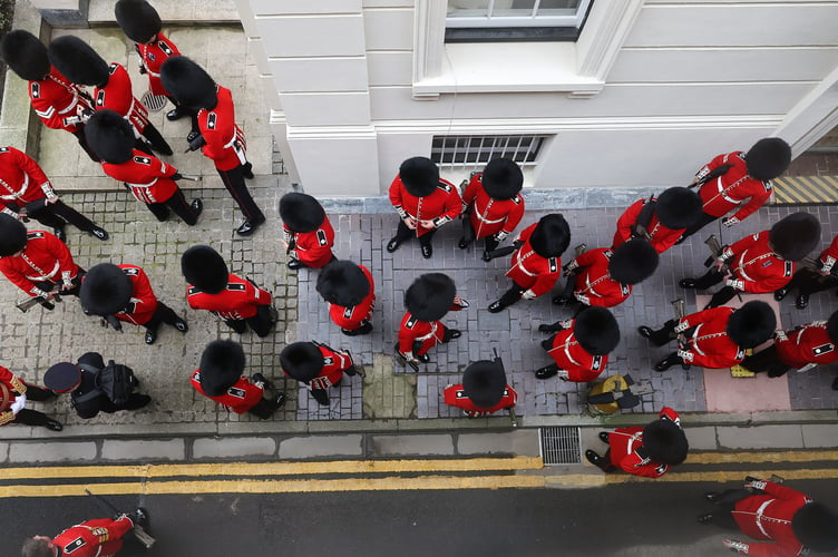 Image of military personnel, seen here at Wellington Barracks in London, before taking part in the King's Coronation.

The UK Armed Forces conduct their largest ceremonial operation for 70 years today (06/05/2023), and accompanied Their Majesties King Charles III and Queen Consort Camilla to the Coronation service at Westminster Abbey.

More than 7,000 soldiers, sailors and aviators from across the UK and Commonwealth participated in ceremonial activities across processions, fly pasts and gun salutes marking the historic event.

With around 200 personnel providing a Guard of Honour at Buckingham Palace, together this made up the largest UK military ceremonial operation for 70 years.

As well as marching detachments from across the Household Division, Royal Navy, British Army and Royal Air Force, more than 400 troops from the Commonwealth nations and British Overseas Territories were on parade, representing the diversity and traditions of Armed Forces around the globe with connections to His Majesty The King.

Foot Guards of the Household Division lined The Mall, the Royal Navy lined their spiritual home at Admiralty Arch, the Royal Marines at Trafalgar Square and the Royal Air Force Whitehall and Parliament Square.


