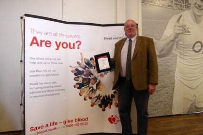 Man who first gave blood in exchange for beer joins '100 donor' club