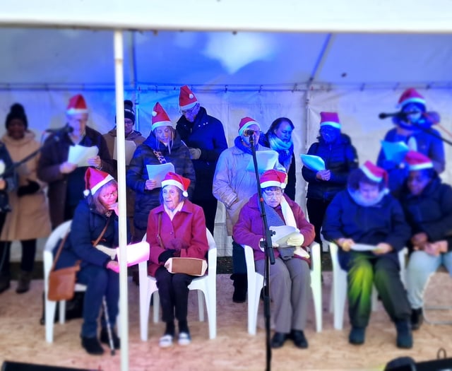 Festive joy for Bordon group on choir's debut at Grayshott light event