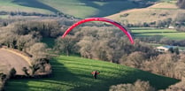 Sky Surfing Club members fly from Butser Hill near Petersfield