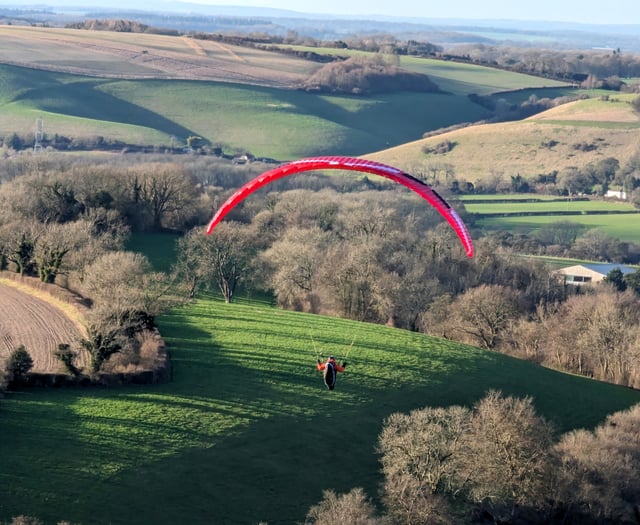 Sky Surfing Club members fly from Butser Hill near Petersfield