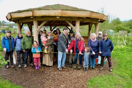 Blooming wonderful as mayor opens eco-shelter at community garden