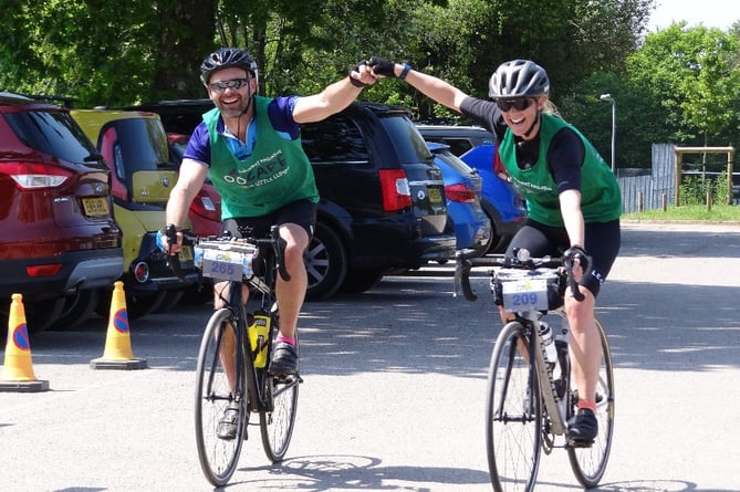 Dan and Claire cross the finish line