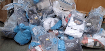 Police seize £50,000 worth of fake football shirts in Haslemere raid